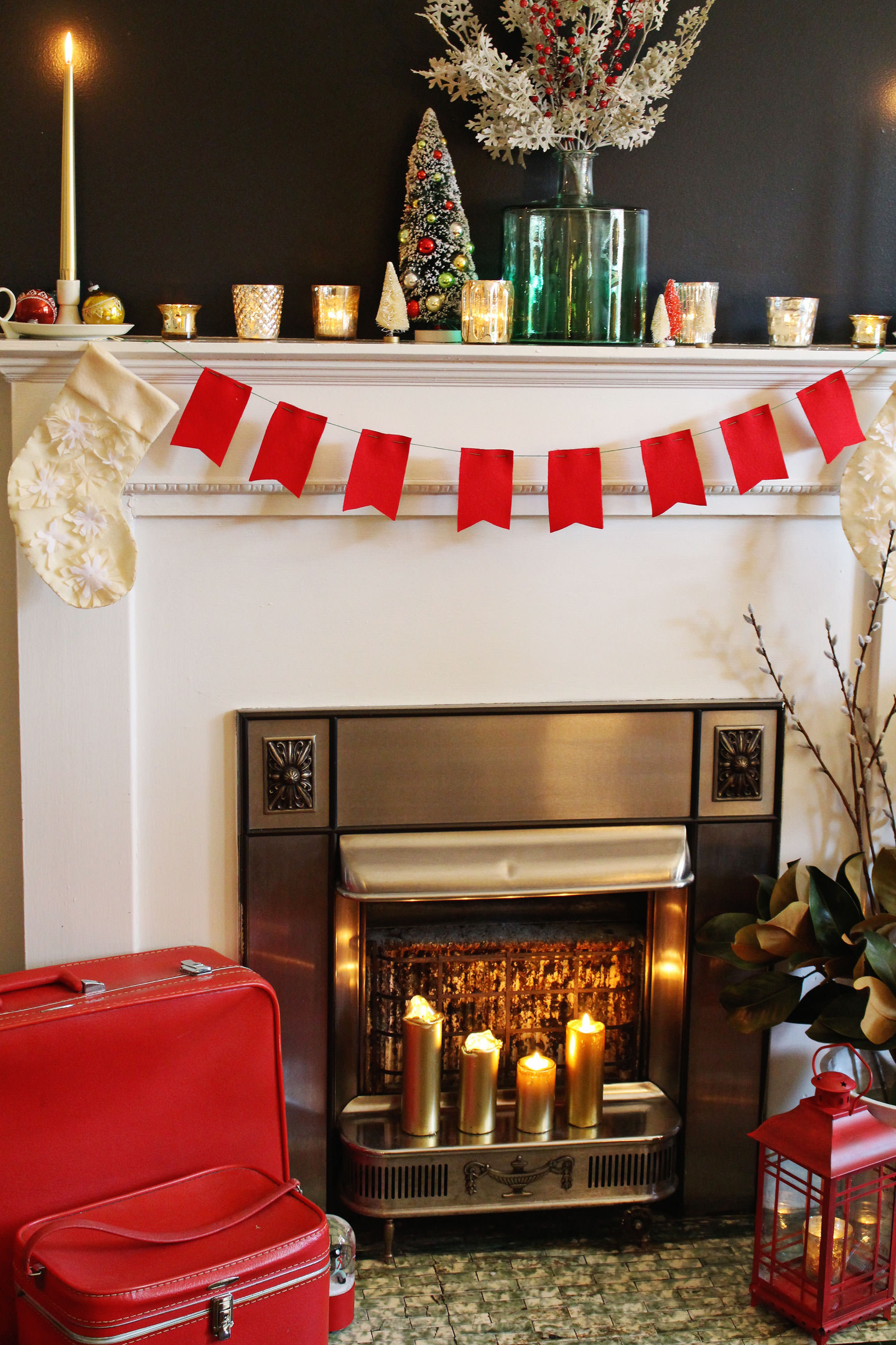 Bottle brush tress and vintage ornaments are perfect accents to display on a holiday mantel