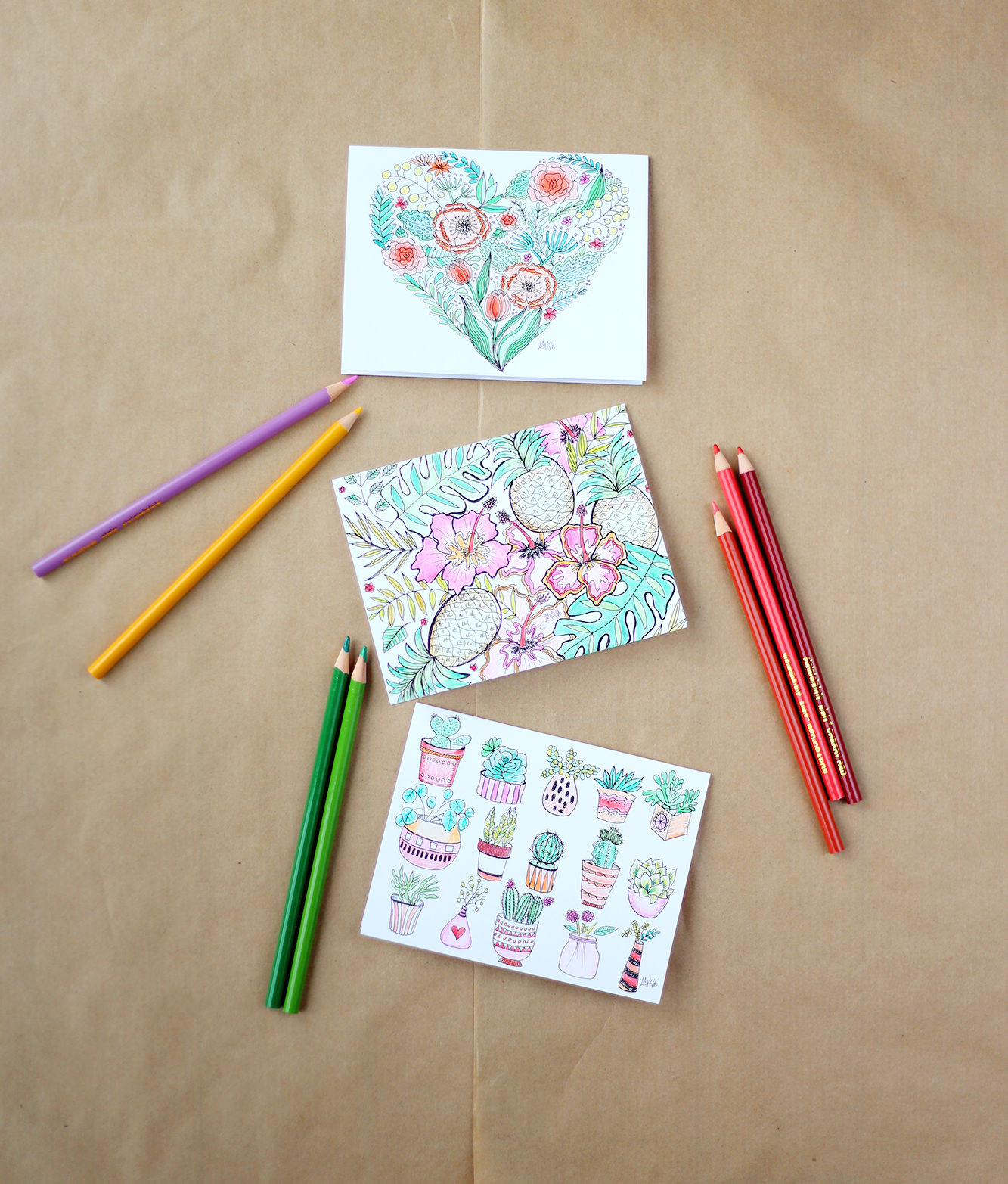 These three cards are included in the Lily & Val assorted coloring notes set. Color them and send them off!