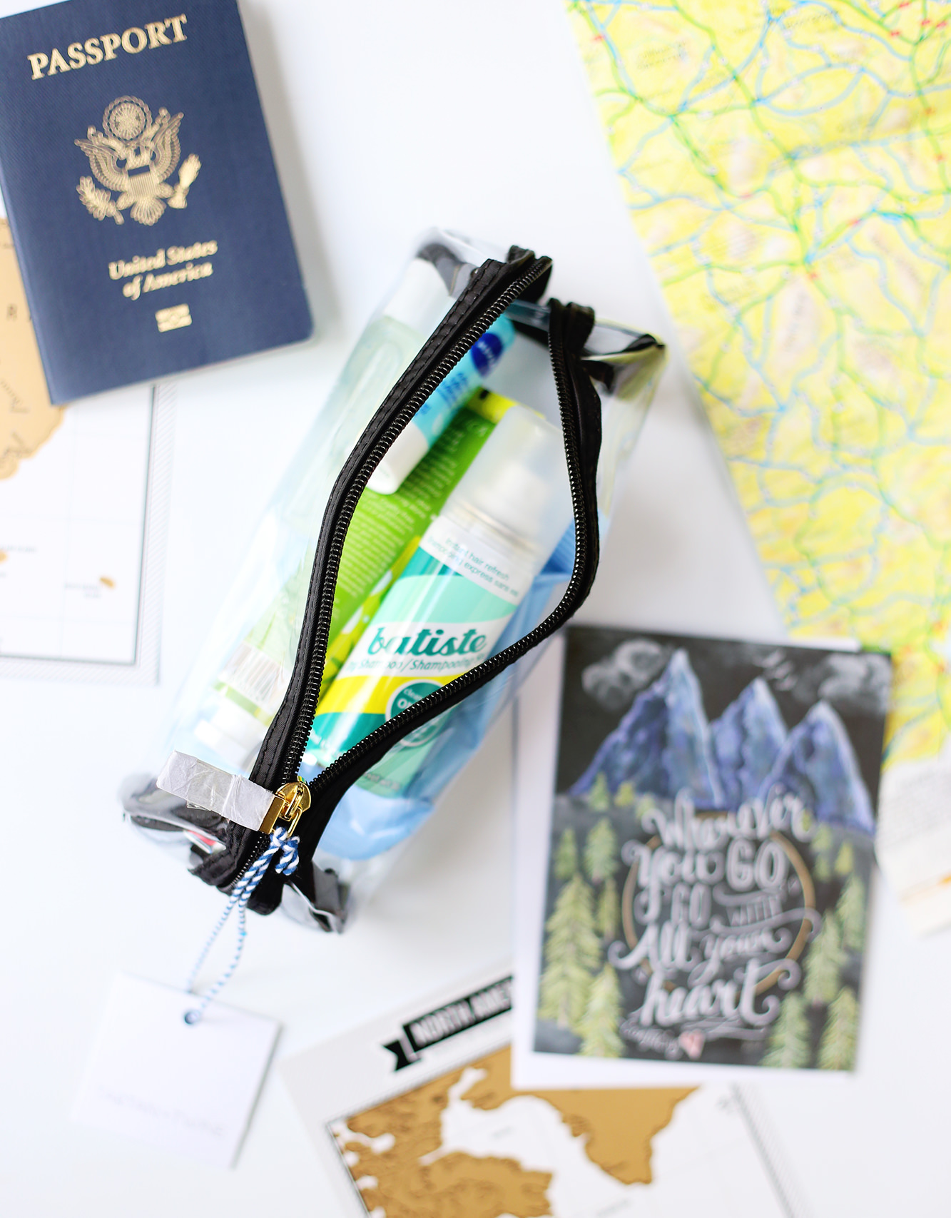 Create a travel-themed Happy Mail by gathering some must-have travel items! See how on Lily & Val Living!
