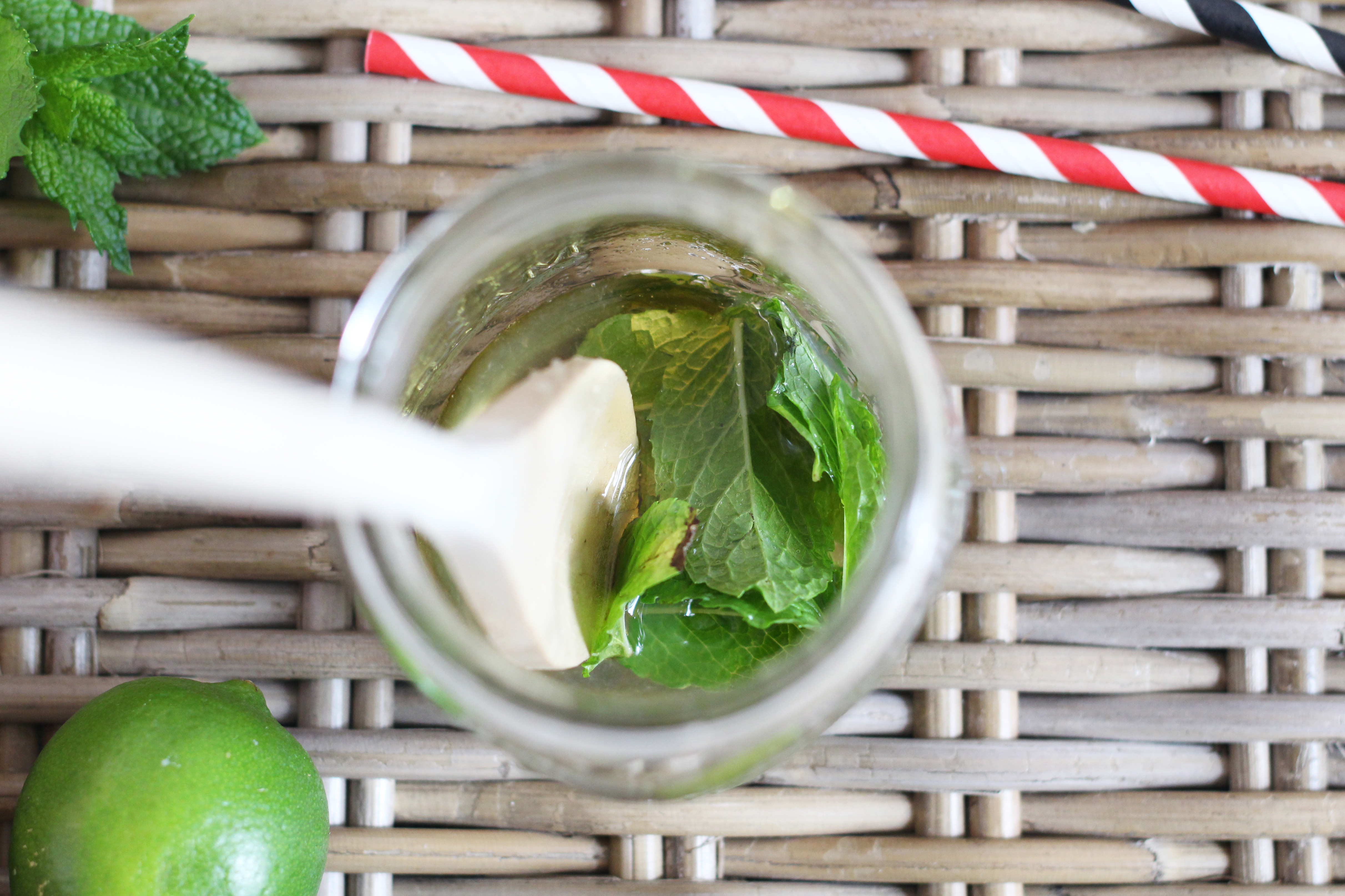 Muddle fresh mint, lime juice, and honey for the base of our Coconut Lime La Croix Mocktail