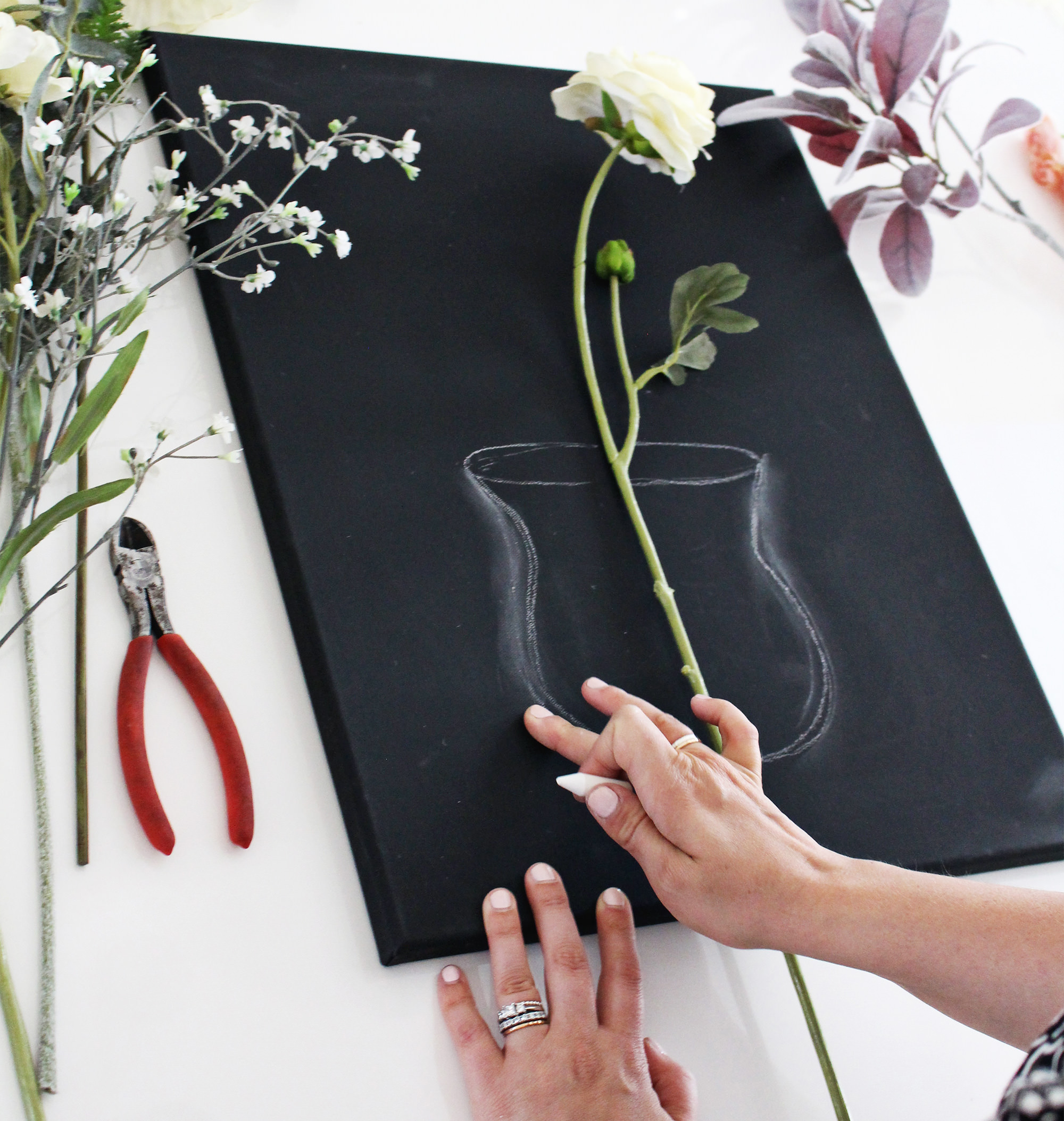 Fun fact: You can use chalk on a black canvas to achieve an authentic chalkboard art look that won't smudge as easily!