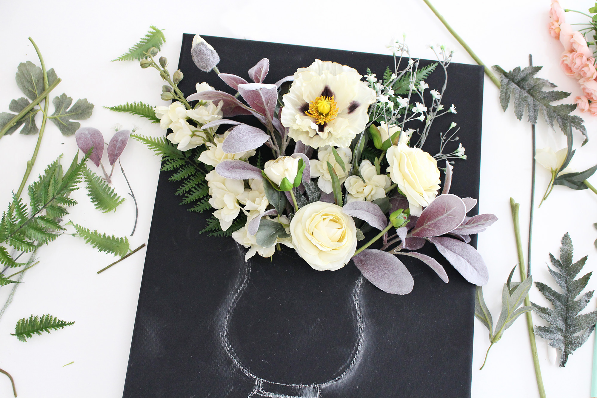 Handmade wall art on Lily & Val Living! Learn how to make a DIY 3-D flower canvas with a chalk art vase