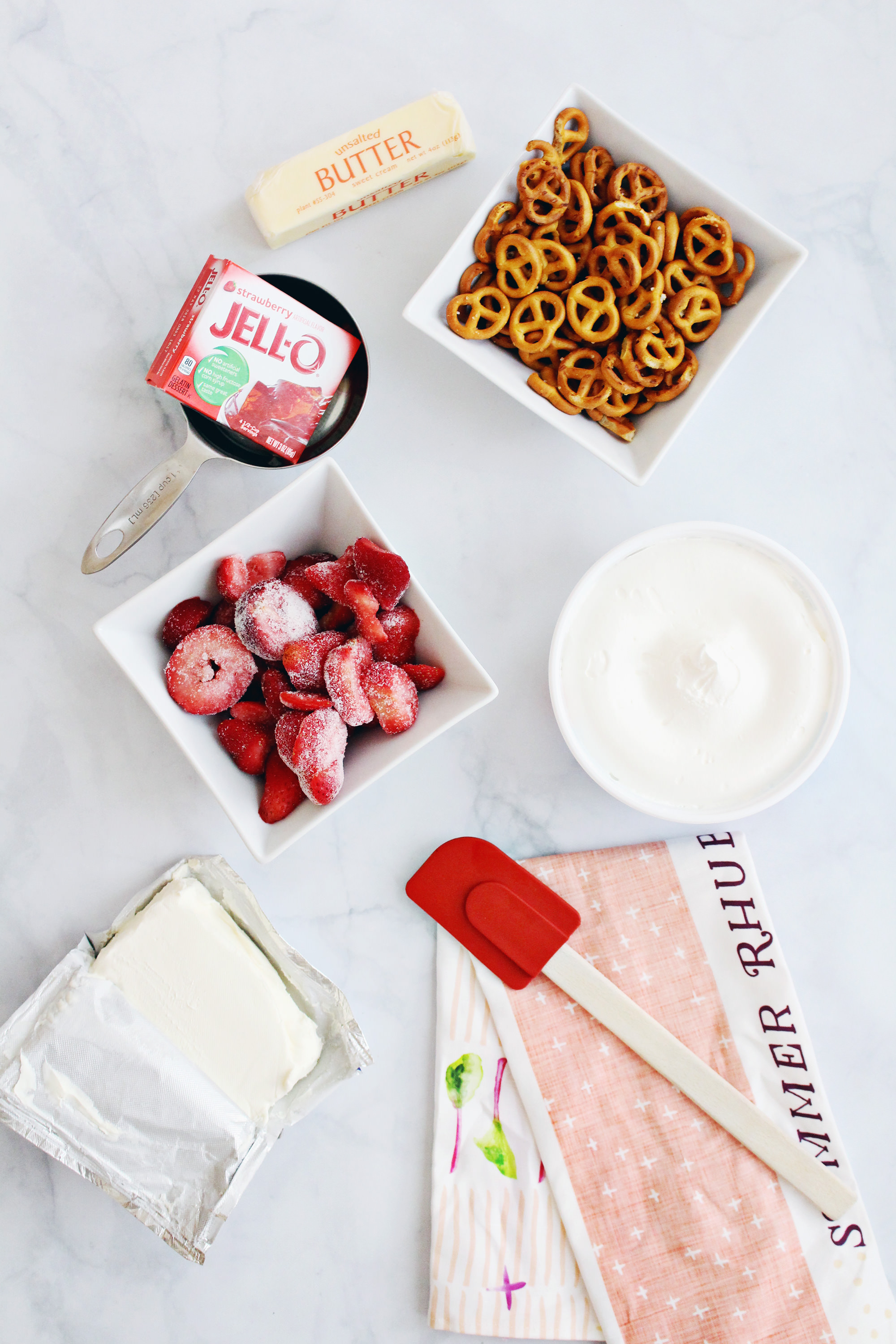 Strawberry Pretzel dessert recipe on Lily & Val Living. This dessert is a crowd-pleaser!