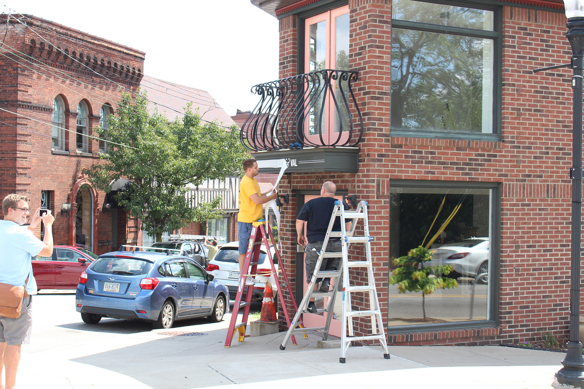 The unveiling of the Lily & Val logo on our Flagship Store in Pittsburgh, PA