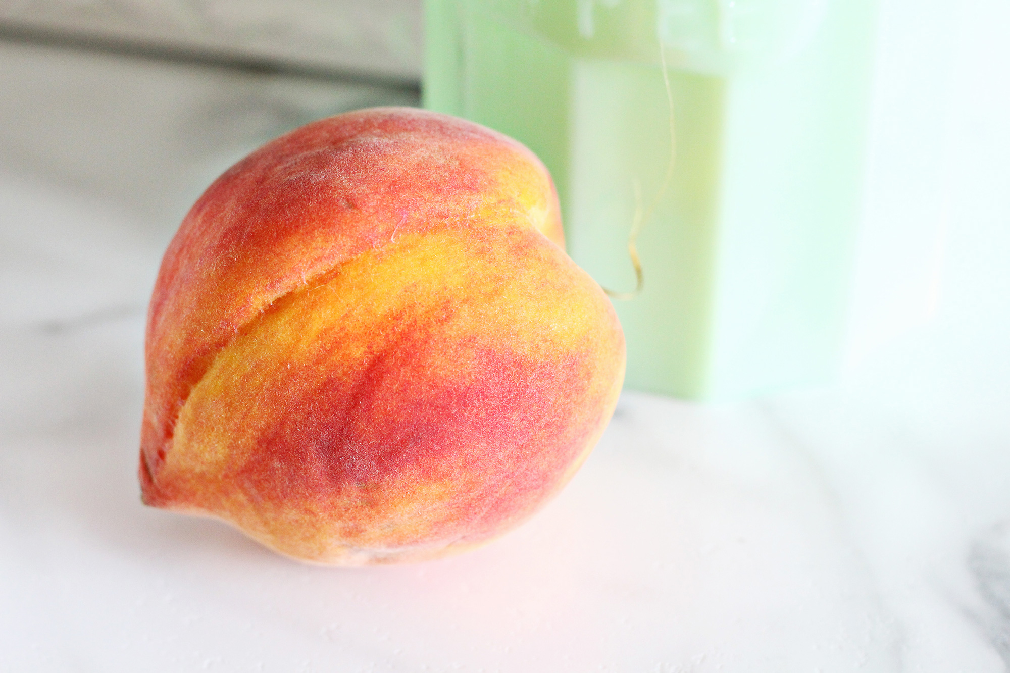 We love peach season! Fresh Peach Cobbler Recipe on Lily & Val Living. 