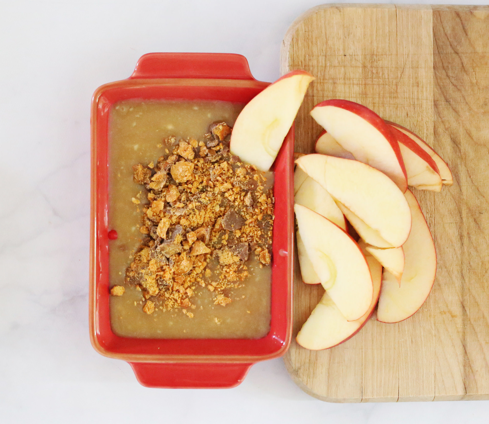Candy toppings for a delicious caramel apple dip on Lily & Val Living!