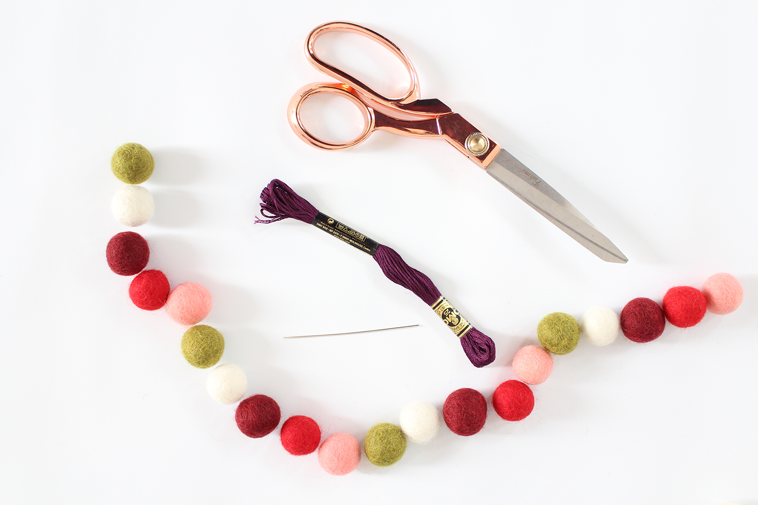 DIY felt ball garland for the holidays on Lily & Val Living