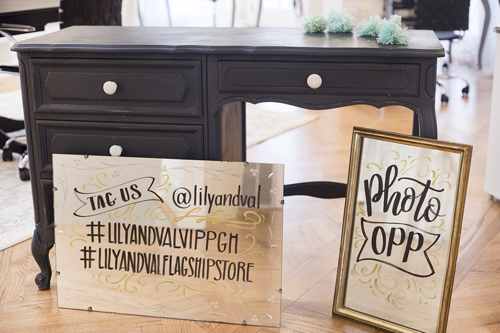 Chalk Ink Markers being used on vintage glass mirrors for a Lily & Val VIP Happy Hour Party