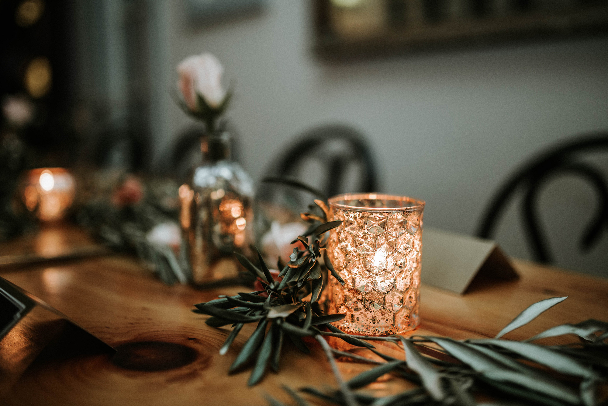 Mercury glass and fresh olive branch centerpieces at the Lily & Val Christmas Party held at PointBreezeway 