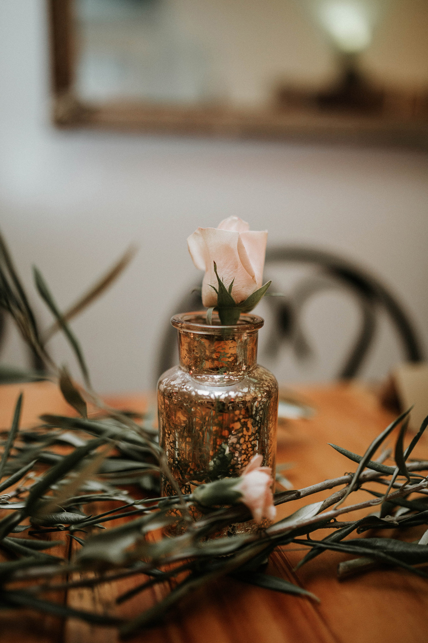 Mercury glass and fresh olive branches at the Lily & Val Christmas Party held at PointBreezeway 