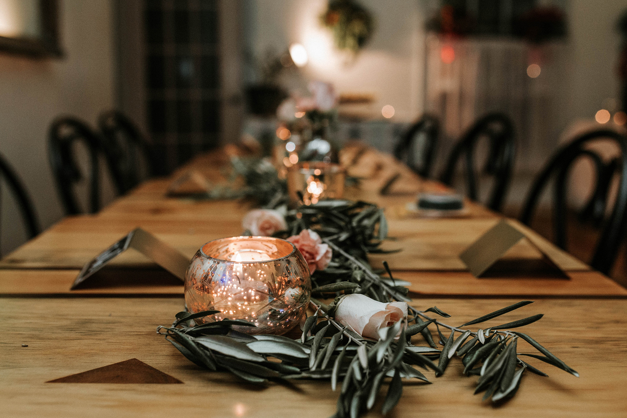 Mercury glass and fresh olive branches at the Lily & Val Christmas Party held at PointBreezeway 