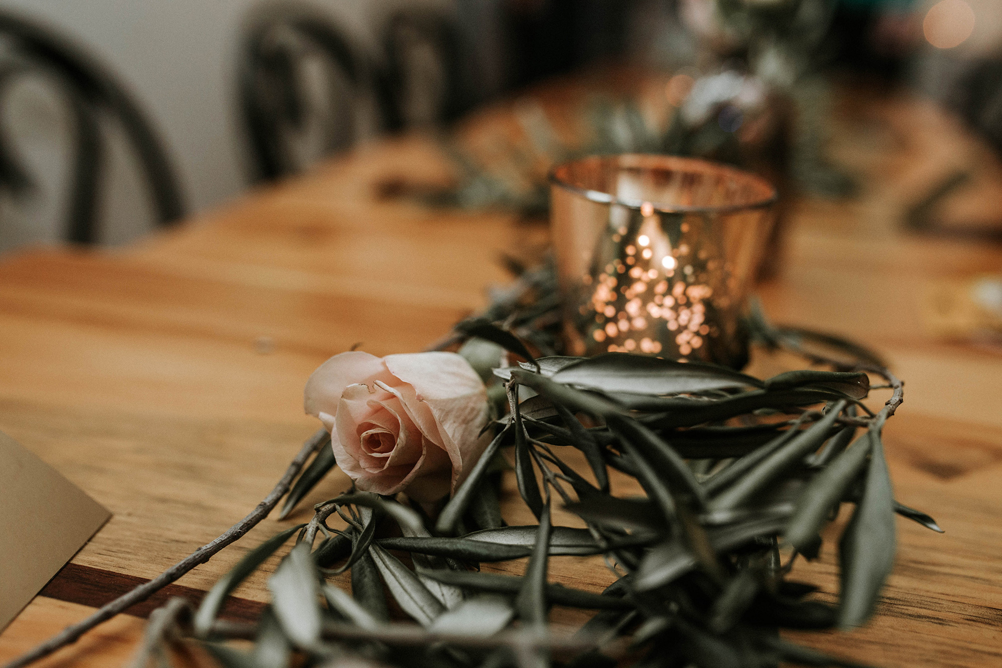 Mercury glass and fresh olive branches at the Lily & Val Christmas Party held at PointBreezeway 