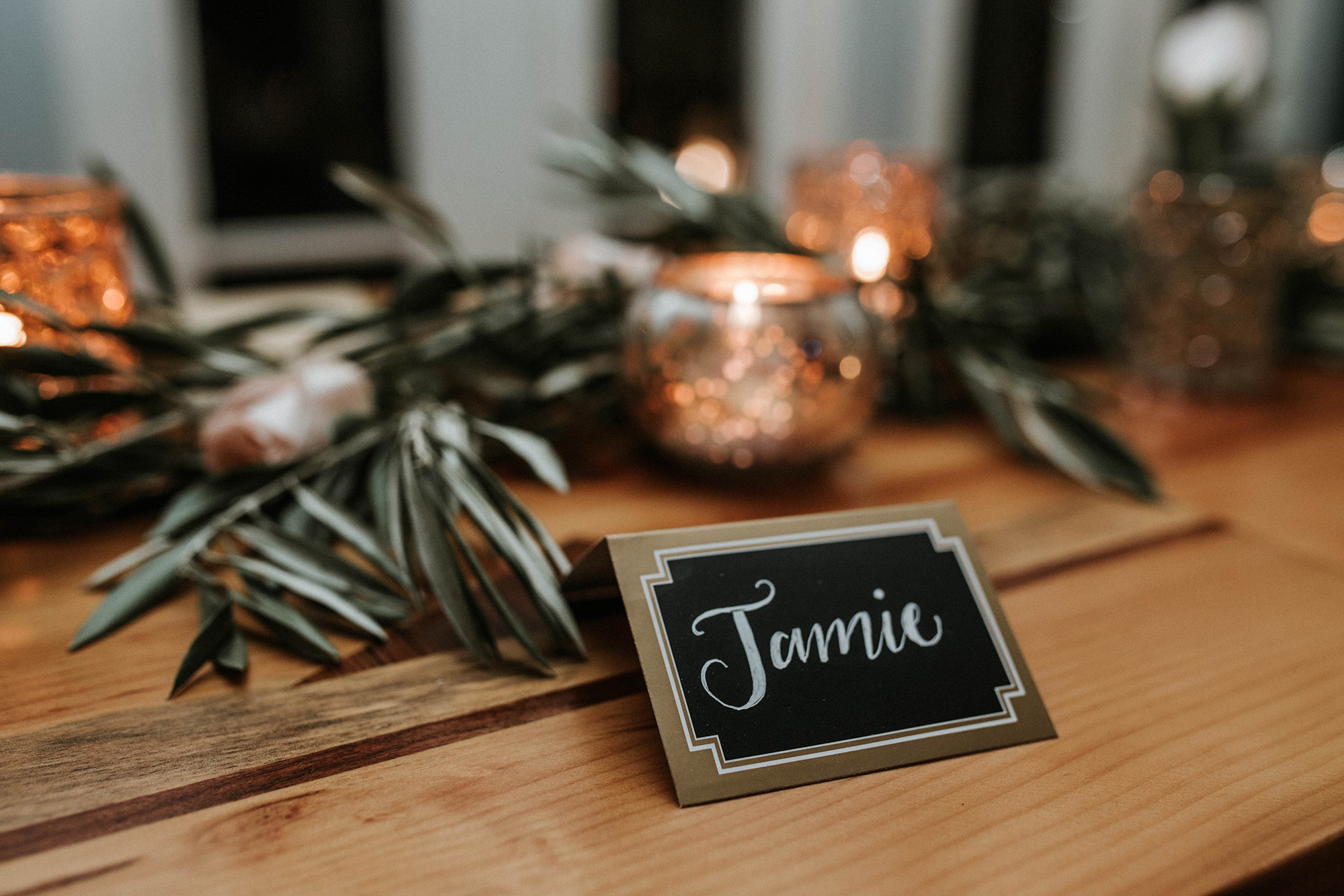 Hand-lettered place cards, Mercury glass and fresh olive branches at the Lily & Val Christmas Party held at PointBreezeway 