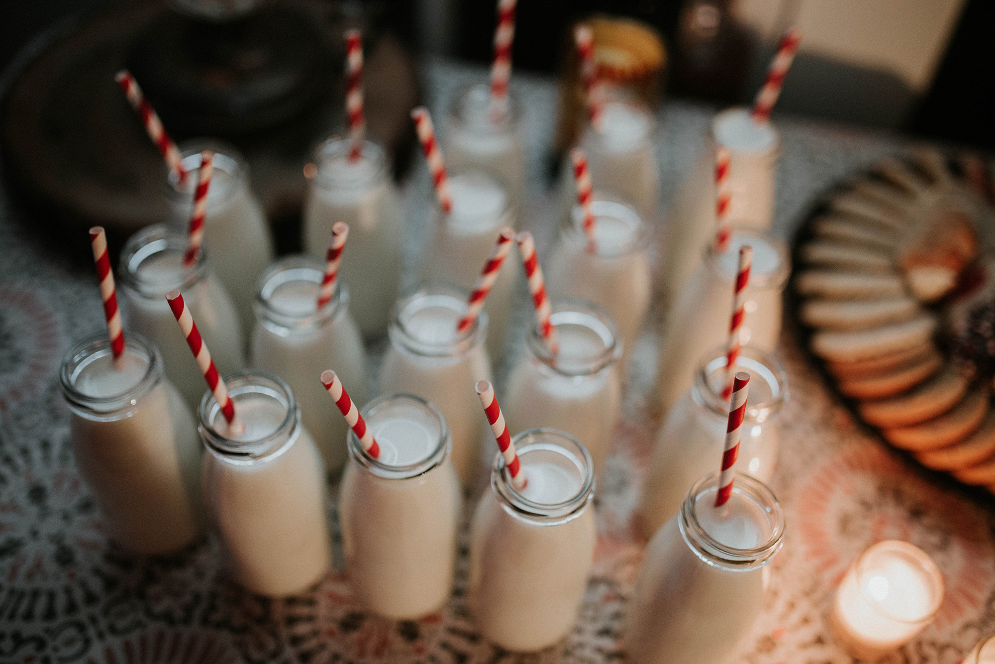 Milk served in vintage glass bottles for the Lily & Val Company Christmas Party