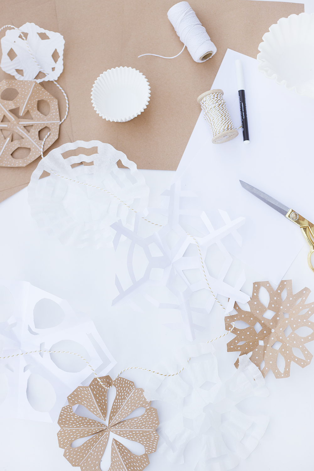 Make these modern paper snowflakes for your home this winter! Using different textures is a must for creating visual interest. Click through to read our easy DIY!