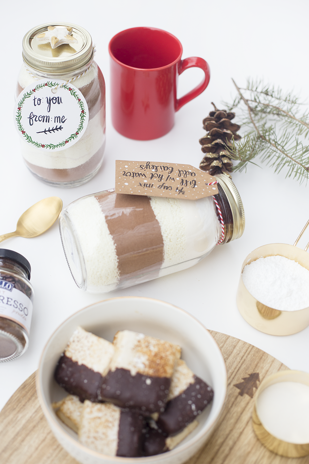 Need a last minute gift? Or just a great recipe? This is the creamiest hot chocolate you've ever tasted and when you layer it in a mason jar, it's an adorable gift! Click through to read the recipe!