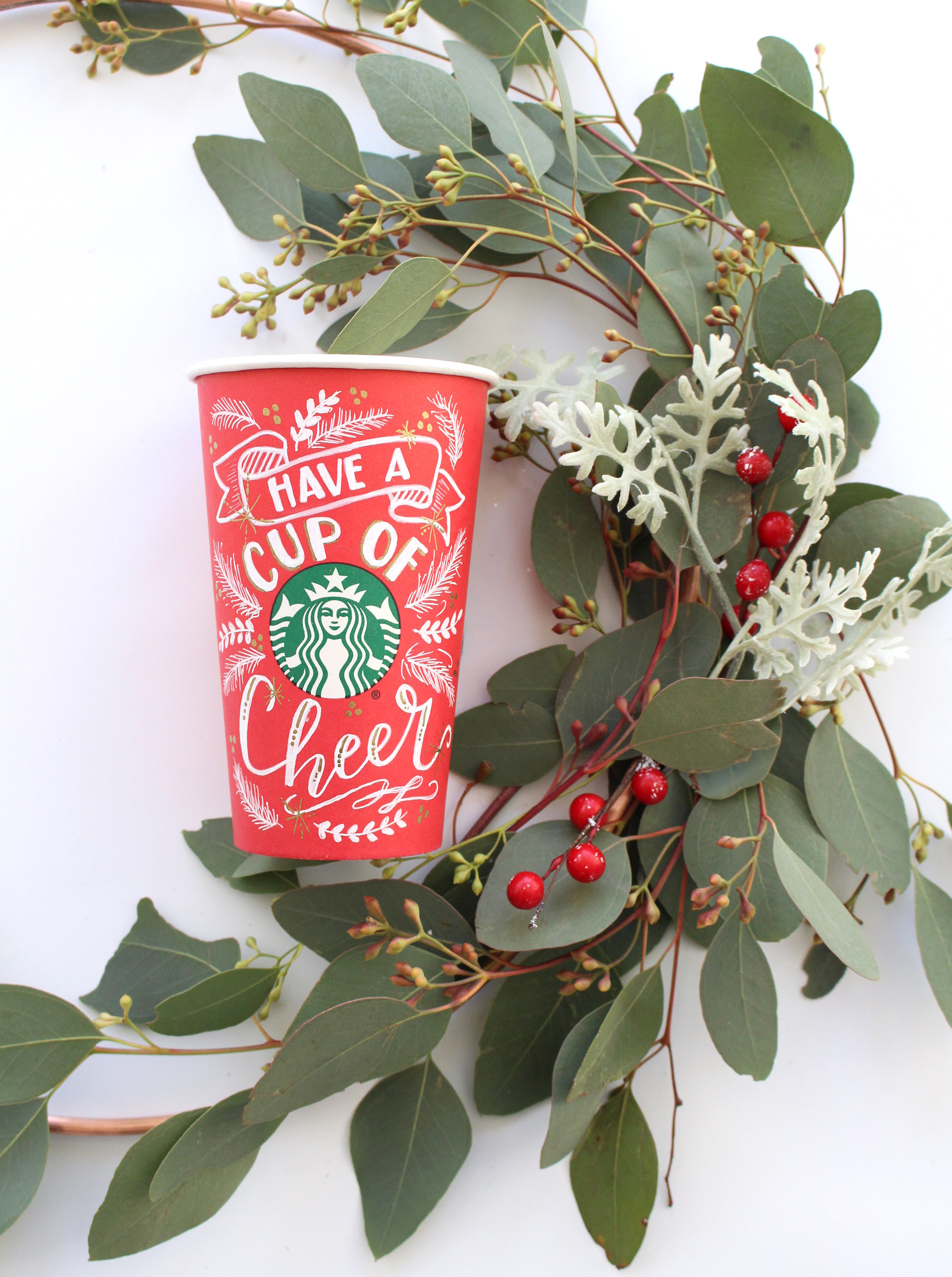 Starbucks is bringing back blank red cups on December 17th for you to add your own holiday flair! This cup was designed by Valerie McKeehan of Lily & Val. 