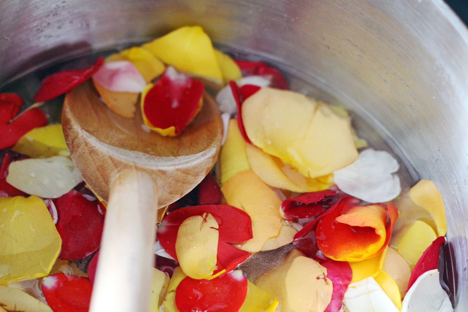 One way to use edible rose petals is by making a homemade rose simple syrup