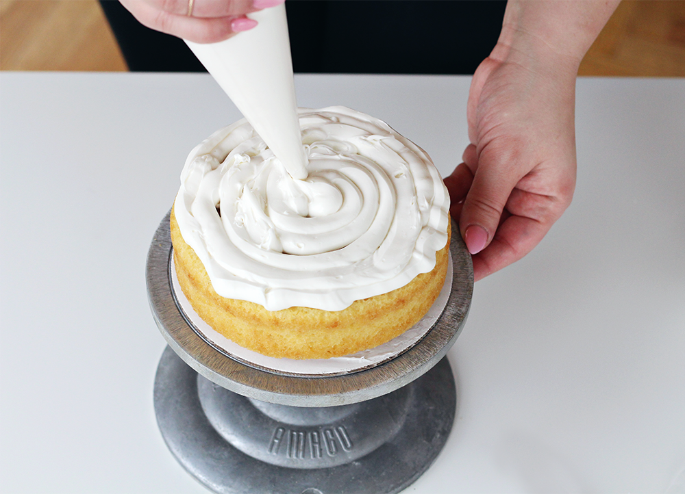 Steps for icing a cake like a pro on the Lily & Val Blog