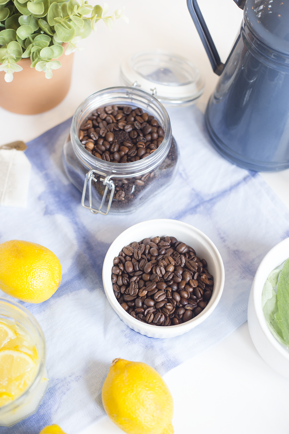 Need to recharge? Try these four at-home spa remedies including a coffee scrub, lemon foot scrub, oatmeal and milk bath, and herb steam facial to recharge. Click through for the recipes!