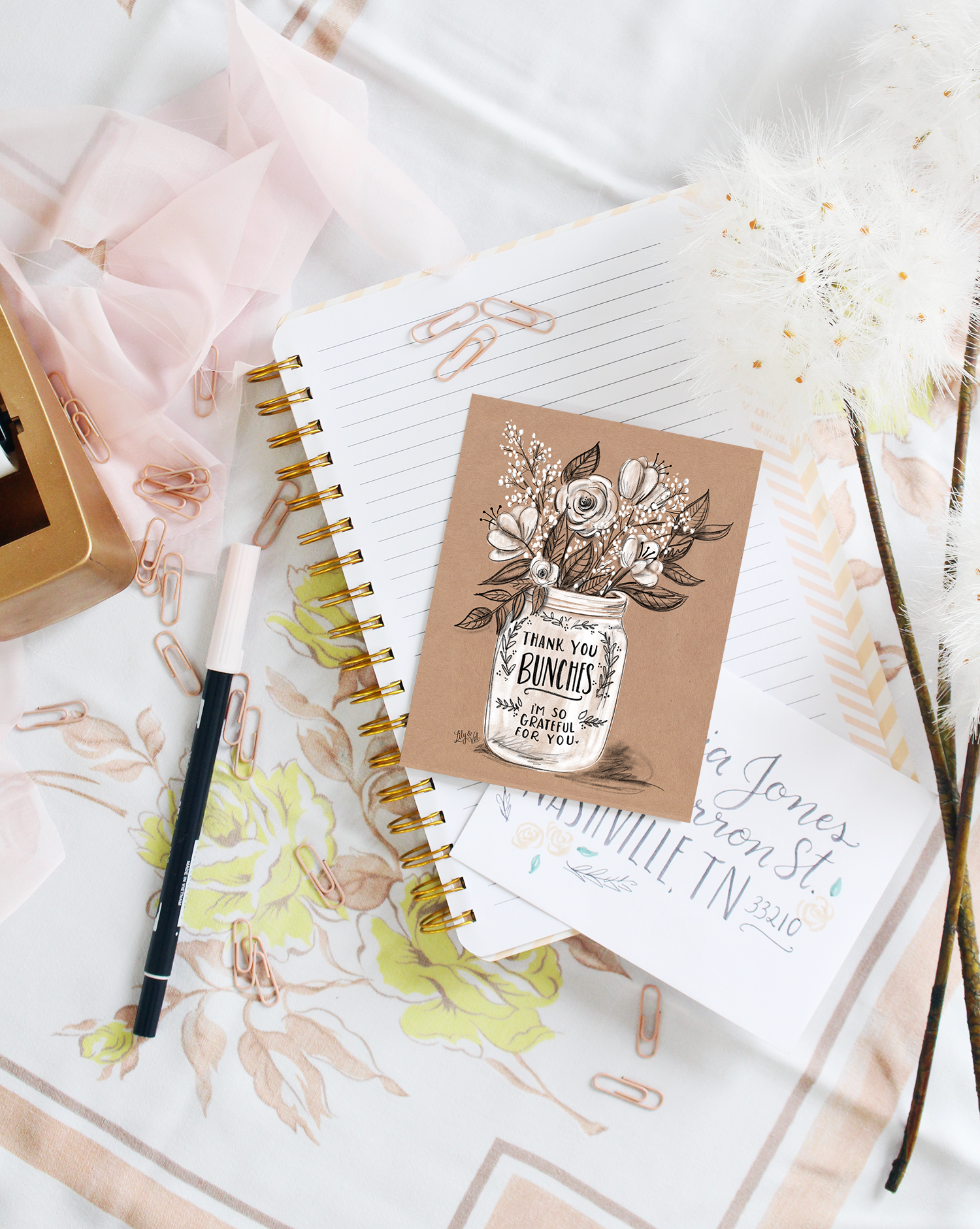 The rustic touch of kraft paper brings a modern feel to this simple "thank you bunches" hand-drawn note card