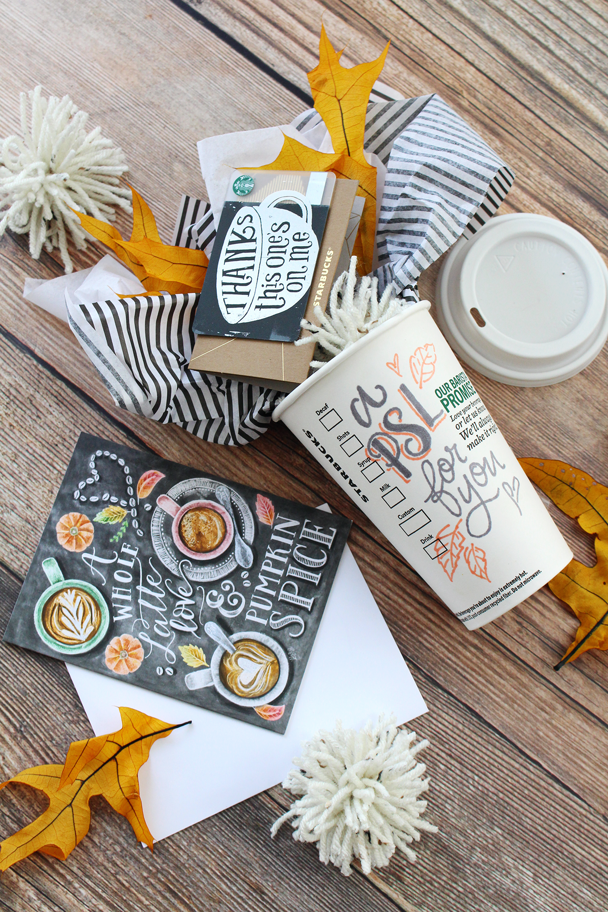 An easy fall gift idea for spreading the pumpkin spice love: hand letter on a starbucks cup, then fill it with a $5 Starbucks gift card and a Lily & Val Pumpkin spice latte card!