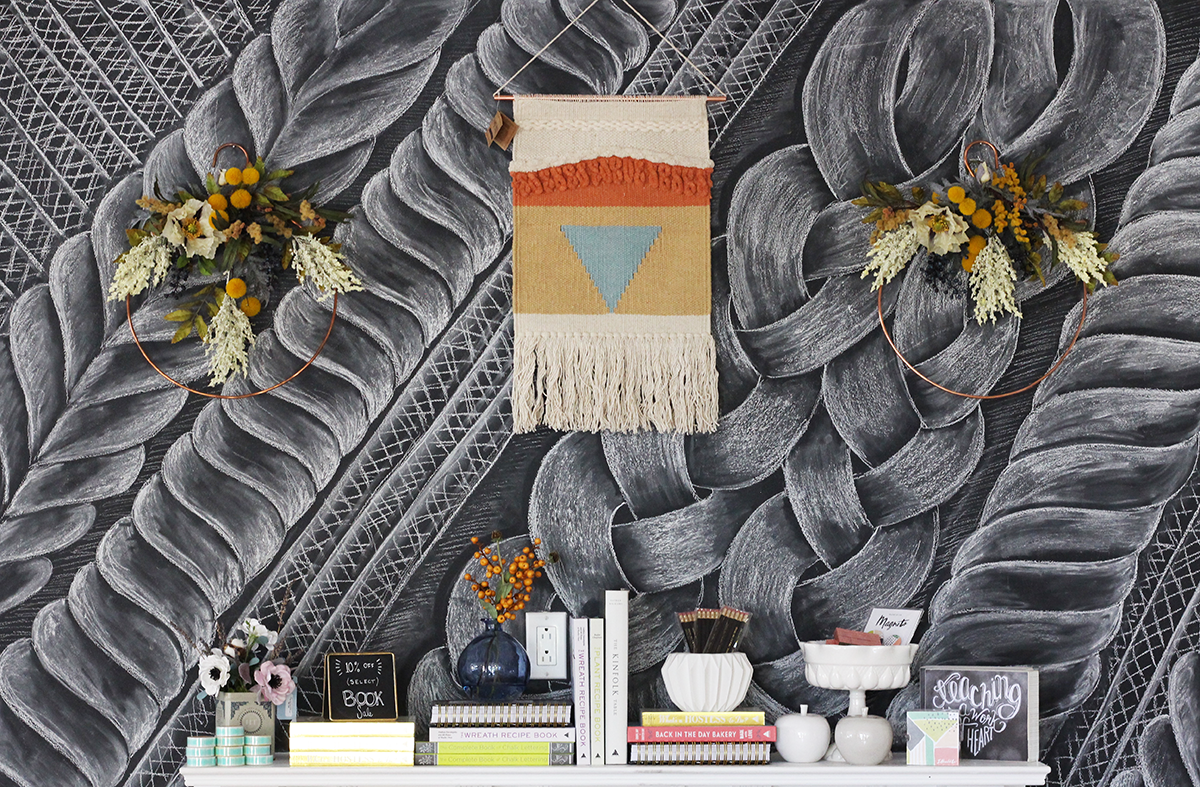 Valerie McKeehan drew a cable knit sweater in chalk on our chalkboard wall mantel at the Lily & Val Flagship Store