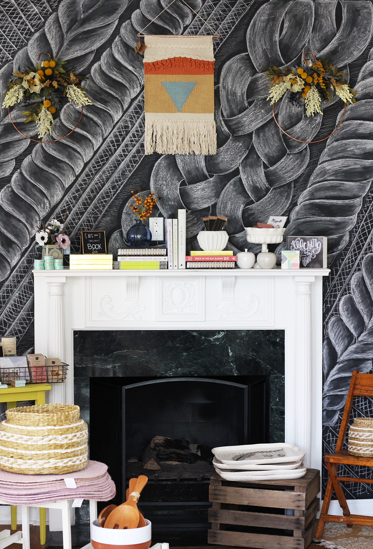 Valerie McKeehan drew a cable knit sweater in chalk on our chalkboard wall mantel at the Lily & Val Flagship Store