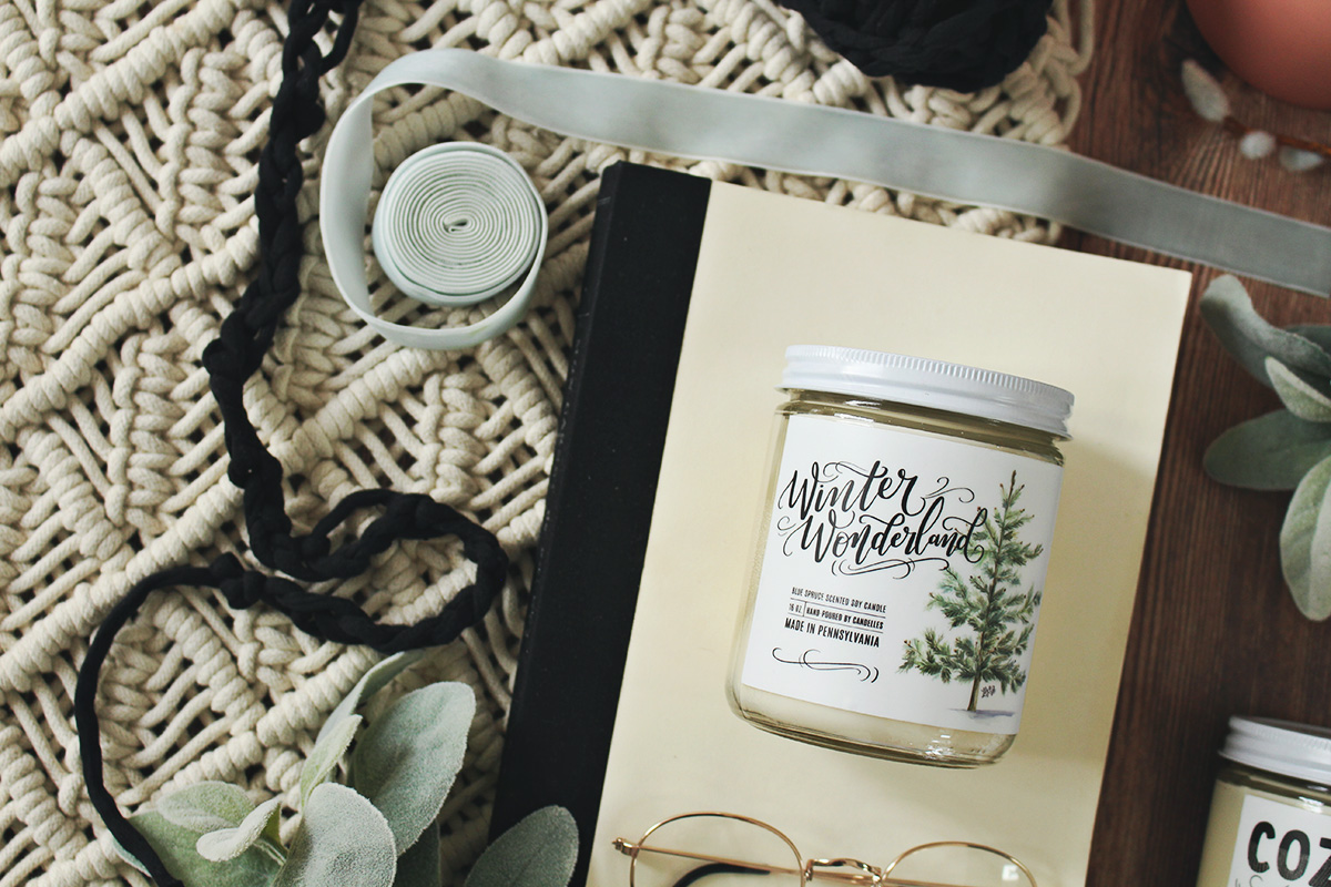 Unique holiday soy candles with labels hand-drawn by Lily & Val and hand-poured by Candelles