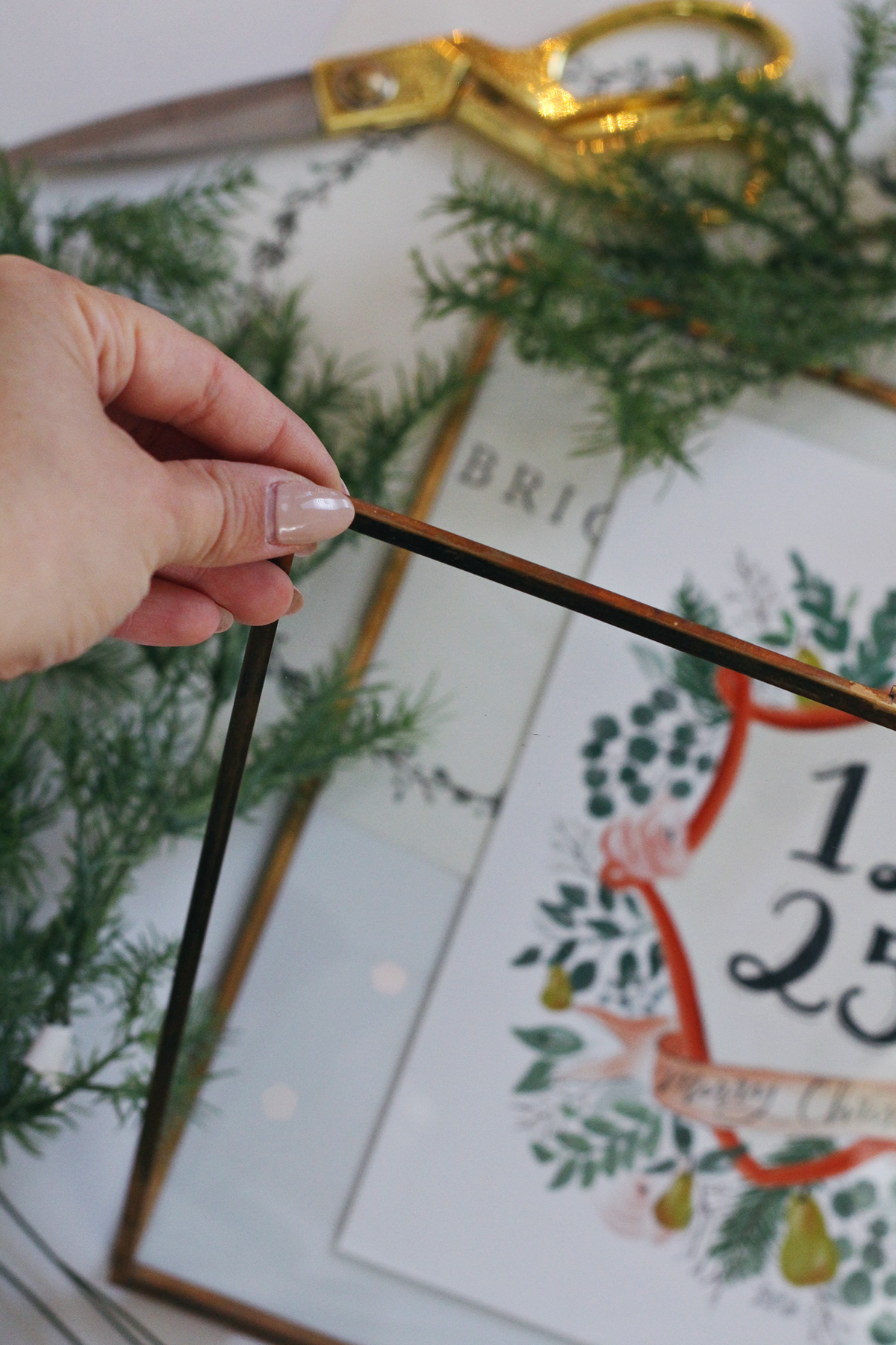 How to use a Hearth & Hand™ brass frame from Target to make this Holiday Wall Hanging
