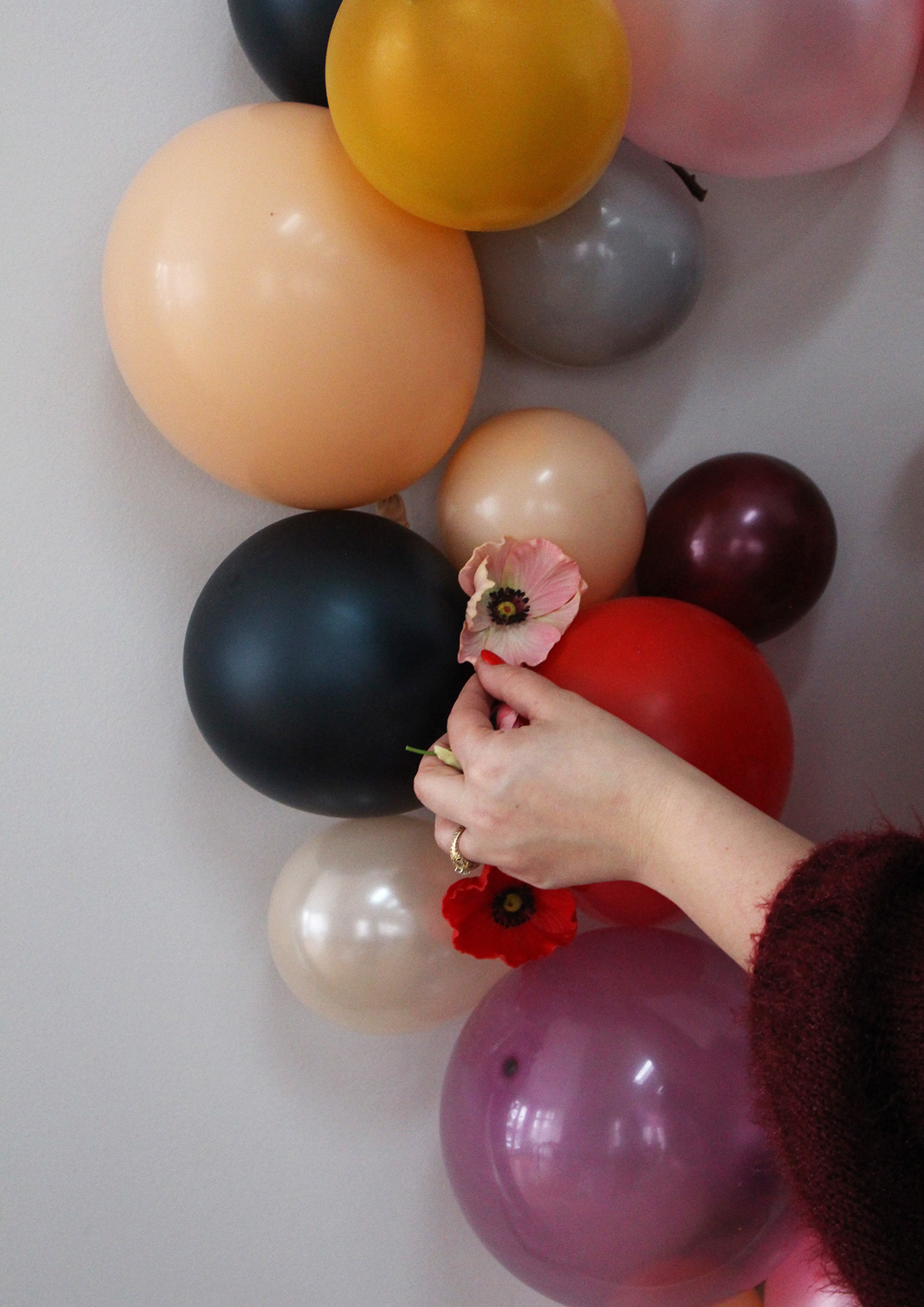 How to make a DIY Balloon and Flower Heart Backdrop For Valentine's Day