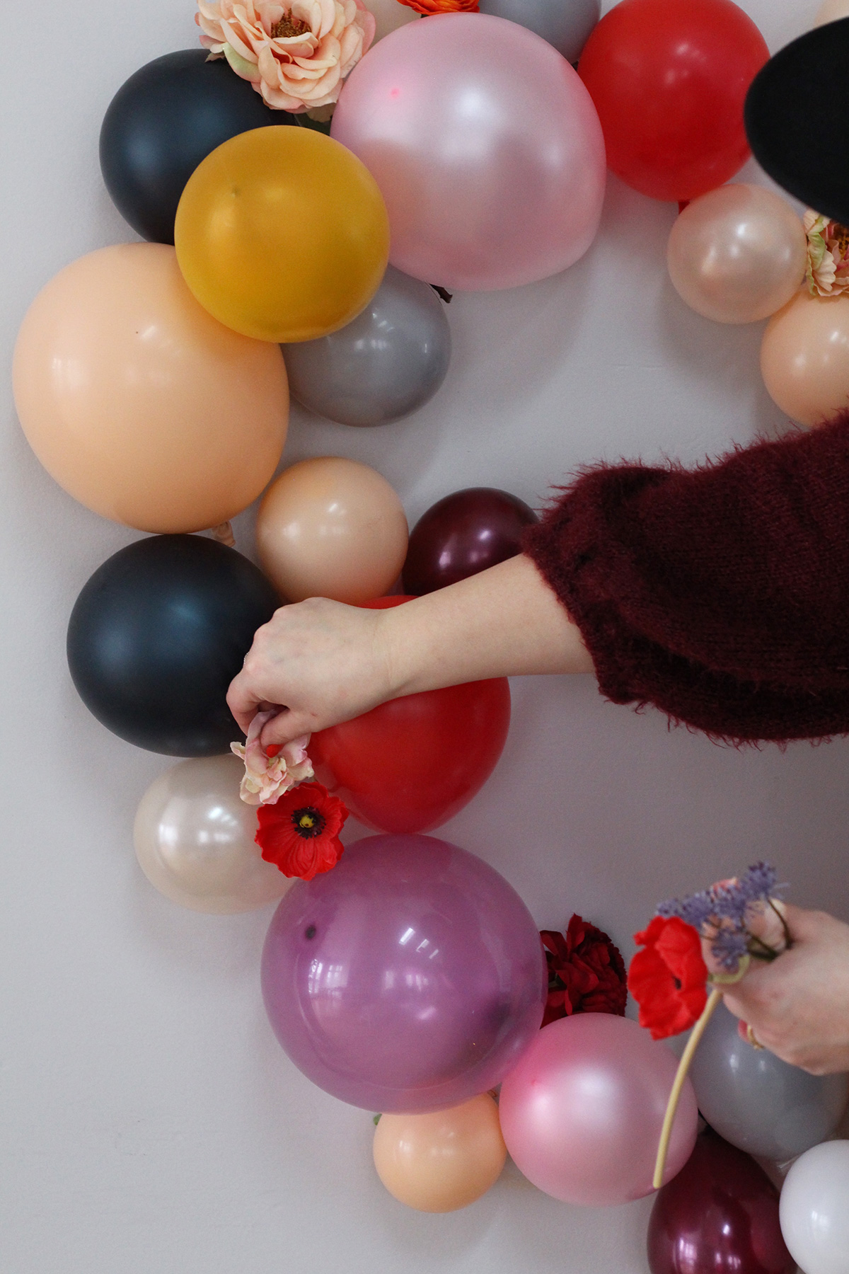 How to make a DIY Balloon and Flower Heart Backdrop For Valentine's Day