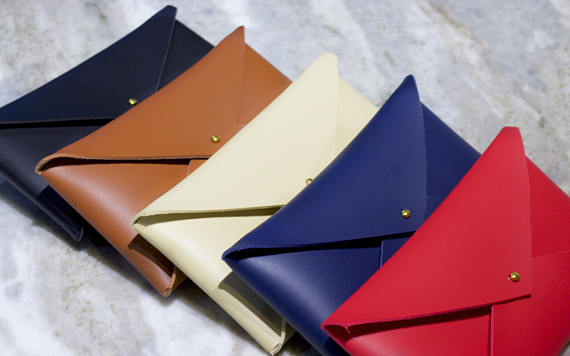 These gorgeous envelope clutches are handmade and super affordable