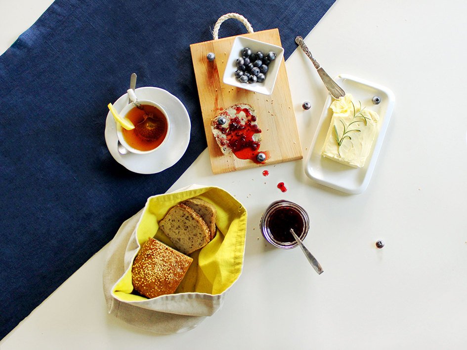 A lovely way to keep and serve your bread. This handmade linen bag ads a sunny touch to any table or buffet. 