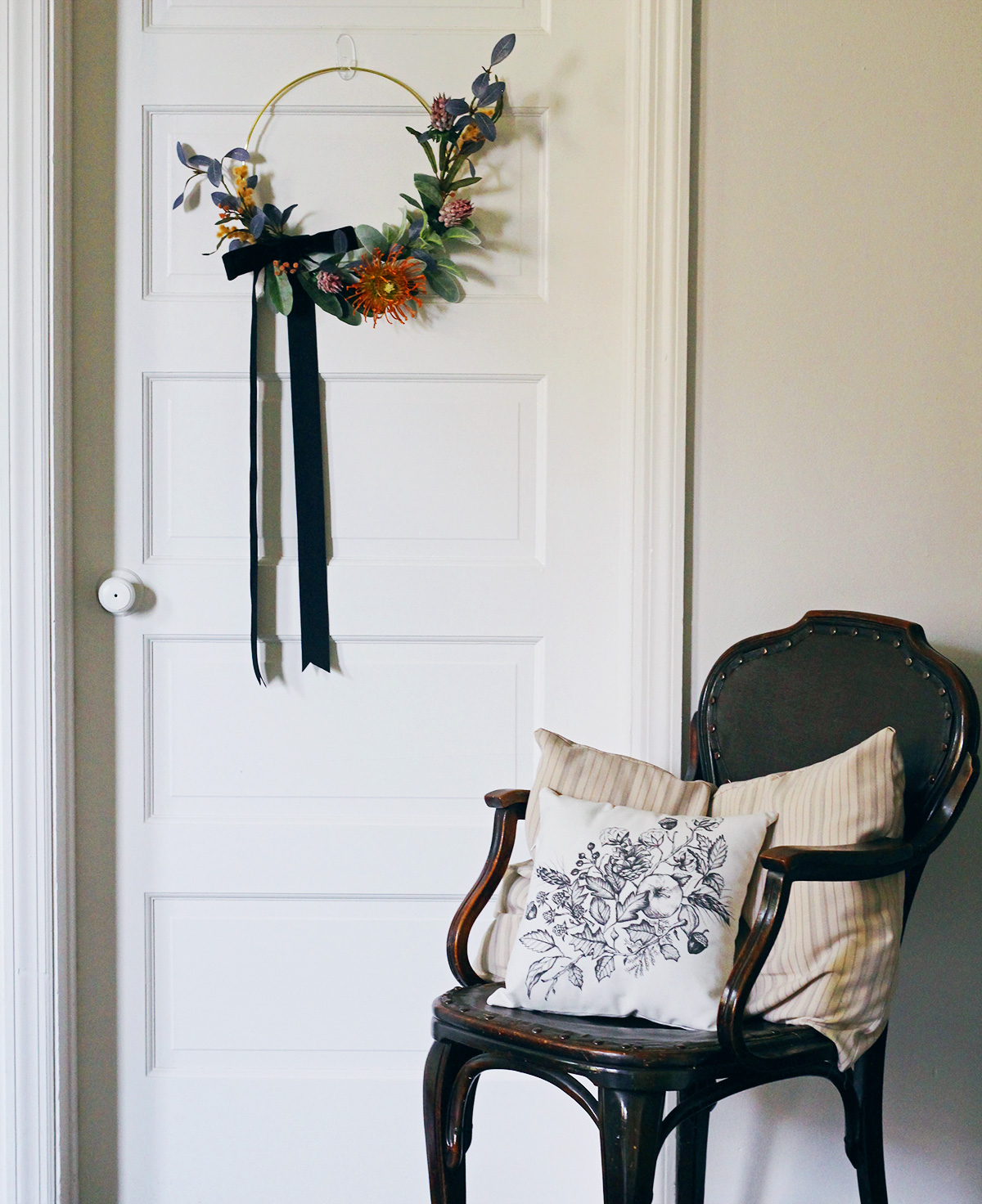 Display a wreath on an interior door 