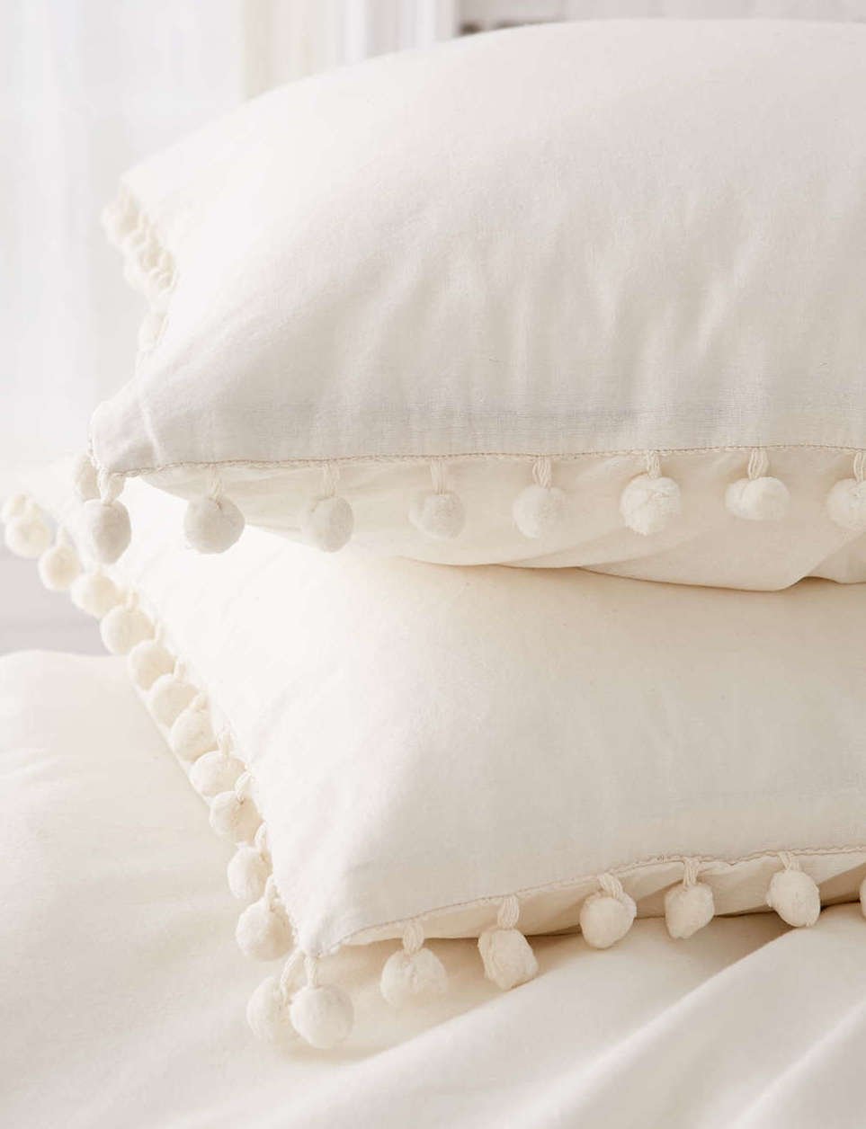 adorable pillow shams with pom pom accents