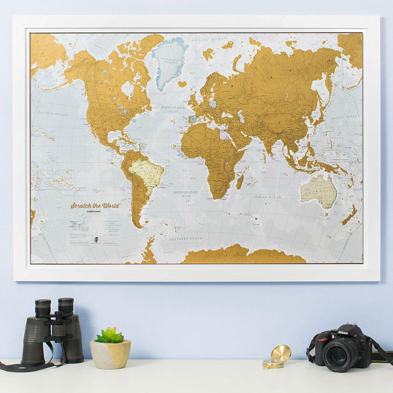 Gold Scratch off Map to document all your adventures. 